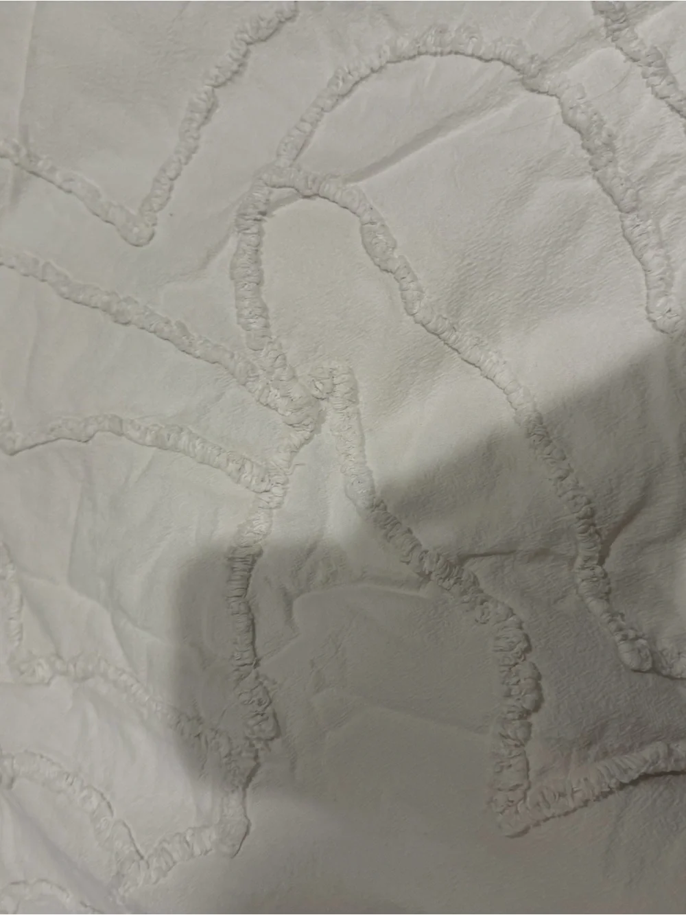 Urban Outfitters Cream Textured Fringe Duvet Cover includes 2 matching shams.